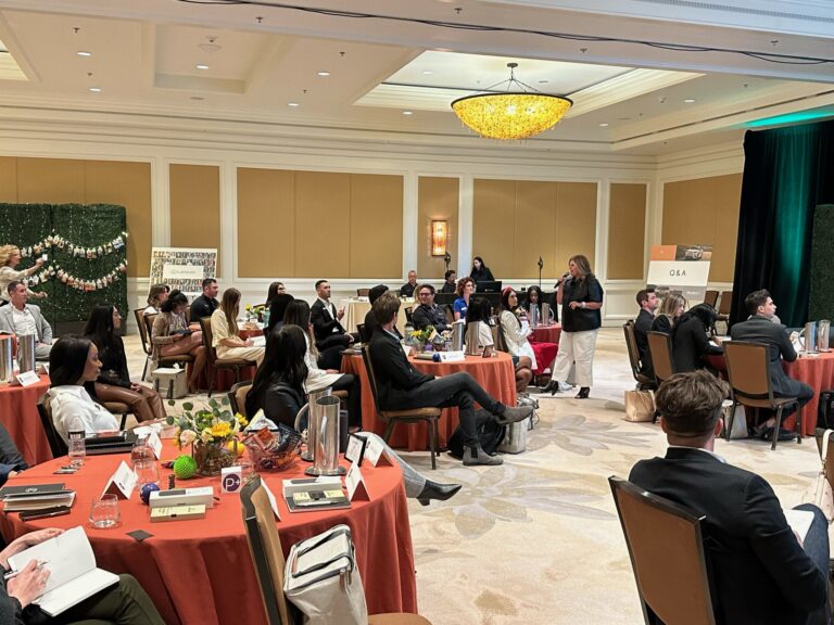 Group of Product Specialists attending Lexus product training in a hotel ballroom