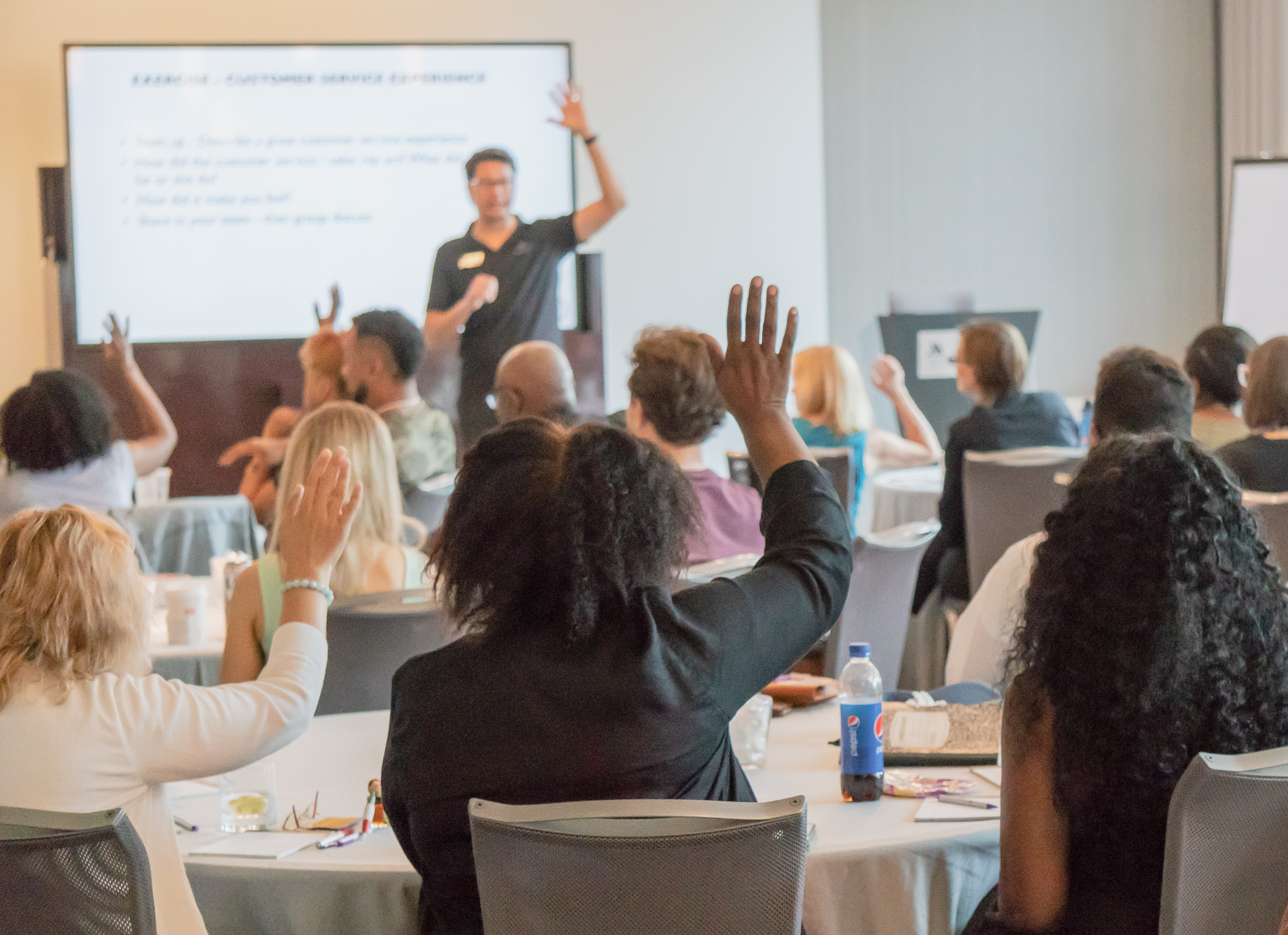 Conference room of people in training session.