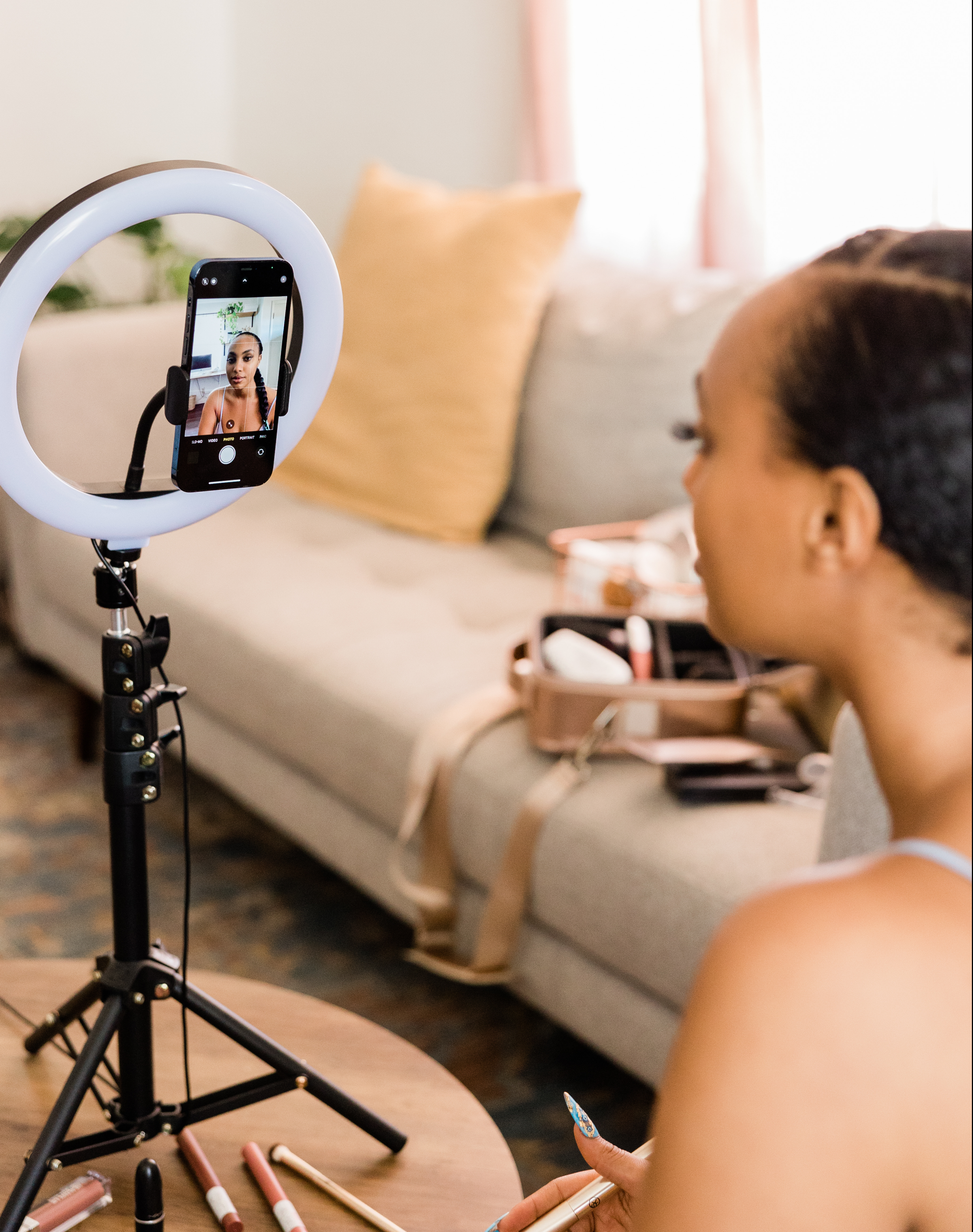 Woman tapes herself for audition