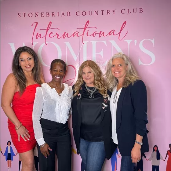 Four female panelists from Women In Charge event with the goal of empowering women in business.